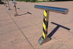 T shape parking barriers. Forbidden access to unauthorized vehicles  