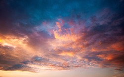 Incredible colorful sunset with cloudy sky. Photo of textured sky. Scenic image of dramatic light in summer weather. Breathtaking natural wallpaper background. Discover the beauty of earth.