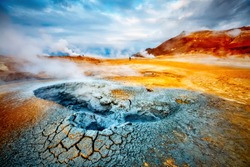 Dramatic view of the geothermal area Hverir (Hverarond). Location place Myvatn lake, Northeastern region, Krafla volcano, Iceland, Europe. Image of exotic world landmark. Discover the beauty of earth.