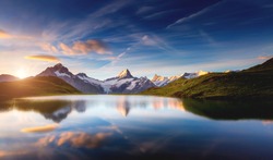 Panoramic view of the Mt. Schreckhorn and Wetterhorn. Popular tourist attraction. Dramatic and picturesque scene. Location place Bachalpsee in Swiss alps, Grindelwald valley, Europe. Beauty world.