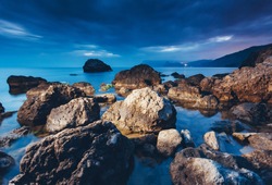 Magic sea in the evening light on a gloomy sky. Dramatic and gorgeous scene. Location place Black Sea, Crimea, Ukraine, Europe. Blue toning effect. Artistic picture. Discover the world of beauty.