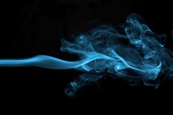 Abstract blue colored smoke isolated on black