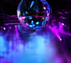 Colorful disco mirror ball lights night club background