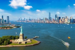 Panoramic aerial view Statue of Liberty and Jersey City and Manhattan cityscape in New York City, NY, USA