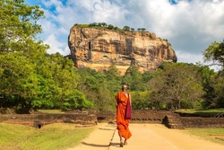 Buddhist monk at  Lion Rock in Sigiriya, Sri Lanka
