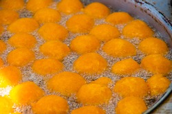 Homemade fritters with sugar and its ingredients latin food, called huevos chilenos