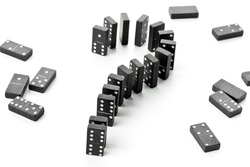 Domino game stones forming question mark - risk, challenge or uncertainty concept