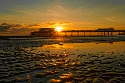 Worthing beach, West Sussex, UK at sunset