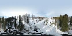 360 degree panoramic aerial view waterfall on small mountain river in winter forest with snow-covered trees