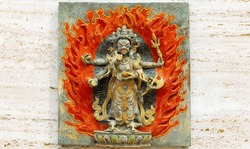 Wall sculpture of Shiva. Front view. Buddhist monastery of el Garraf Sakya Tashi Ling, Barcelona, Spain