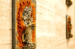 Wall sculpture of Shiva. Side view. Buddhist monastery of el Garraf Sakya Tashi Ling, Barcelona, Spain