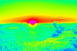 Cold and warmth in landscape, heat from sun rays absorbing. Infrared thermovision image showing thermal radiation. Abstract infrared scan.