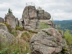 Tanvaldsky Spicak - granite rock formation with lookout platform. Jizera Mountains, Czech Republic