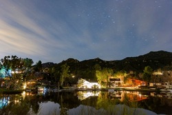 Night view of the Malibu Lake with stars at Los Angeles County, California