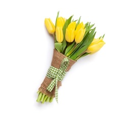 Yellow tulip flowers bouquet on white background. Isolated on white. Top view flat lay