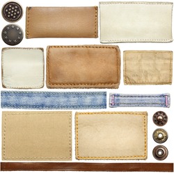 Blank leather jeans labels, buttons, straps isolated on white background