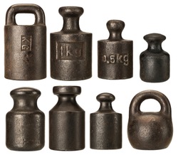 Old rusty iron scale weights isolated on white