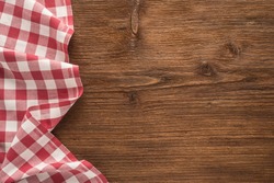 Tablecloth textile on wooden background  