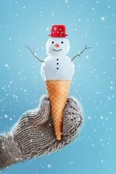 Snowman in an Ice cream cone, cute winter-summer concept 