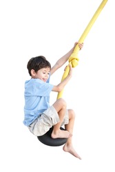 Young boy enjoying on balancing activity  isolated on white background.