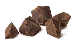 Broken dark chocolate pieces isolated on white background
