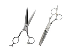 Two pairs of hairdressing scissors for hair cutting. isolated