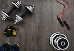 free space on the wooden floor surrounded fitness equipment