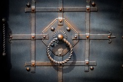 door decoration with ornate wrought-iron elements, close up.