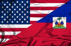 Waving flag of Haiti and USA