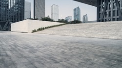 empty brick road nearby office building,china