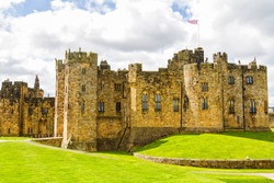Alnwick Castle in Alnwick in the English county of Northumberland, United Kingdom. It is a location for films and programs such as Harry Potter movie.