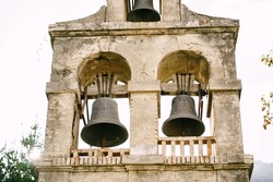 Three bells on the bell tower of the Church of the Nativity of the Virgin in Prcanj