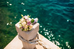 Wedding bouquet on a background of water