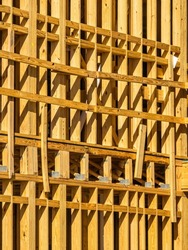 Geometric wooden framework on residential construction site on a sunny day in southwest Florida