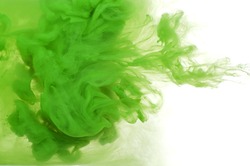Abstract background of green acrylic paint in water. 
