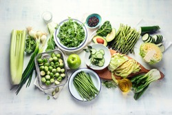 Green vegetables for healthy cooking. Vegetarian and vegan food. Healthy diet eating concept. Top view, flat lay