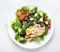 Ketogenic diet meals assortment on light background. Healthy eating concept. Flat lay, top view
