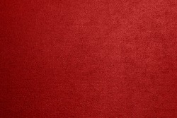 Red textured background with a gradient.