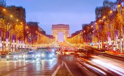 Arch of Triumph and Champs Elysees in Paris at night, France. 