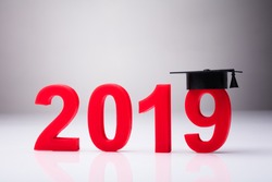 Year 2019 With Graduation Hat On White Background