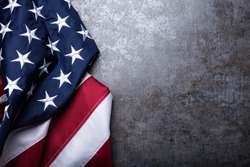 An Overhead View Of American Flag On Dark Concrete Background