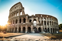 Colosseum Exterior At Sunrise In Rome, Italy
