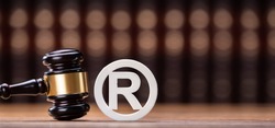 Close-up Of Judge Mallet Near Trademark Copyright Symbol