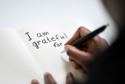 African American Women Writing In Gratitude Journal