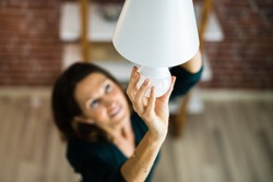 Electric LED Lightbulb Change In Light At Home