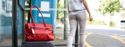 Lost Woman Bag Or Purse At Busstop In Transit