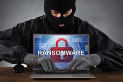 Ransomware Virus. Ransom Extortion Attack. Hacked Encrypted Laptop