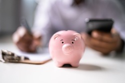 Financial Money Advice. Saving in 401K. Piggybank Deposit