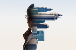 Digital Composite Of City And Contemplating Businessman Portrait