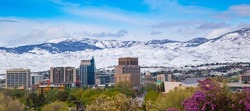 Downtown Boise, Idaho on a spring day after a late snow on the foothills